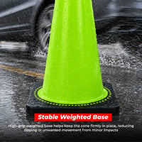 seventy five centimeter green traffic control cone with reflective road markings and weighted base